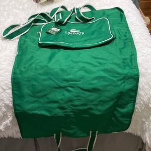 Lacoste luggage garment bag. NEVER USED